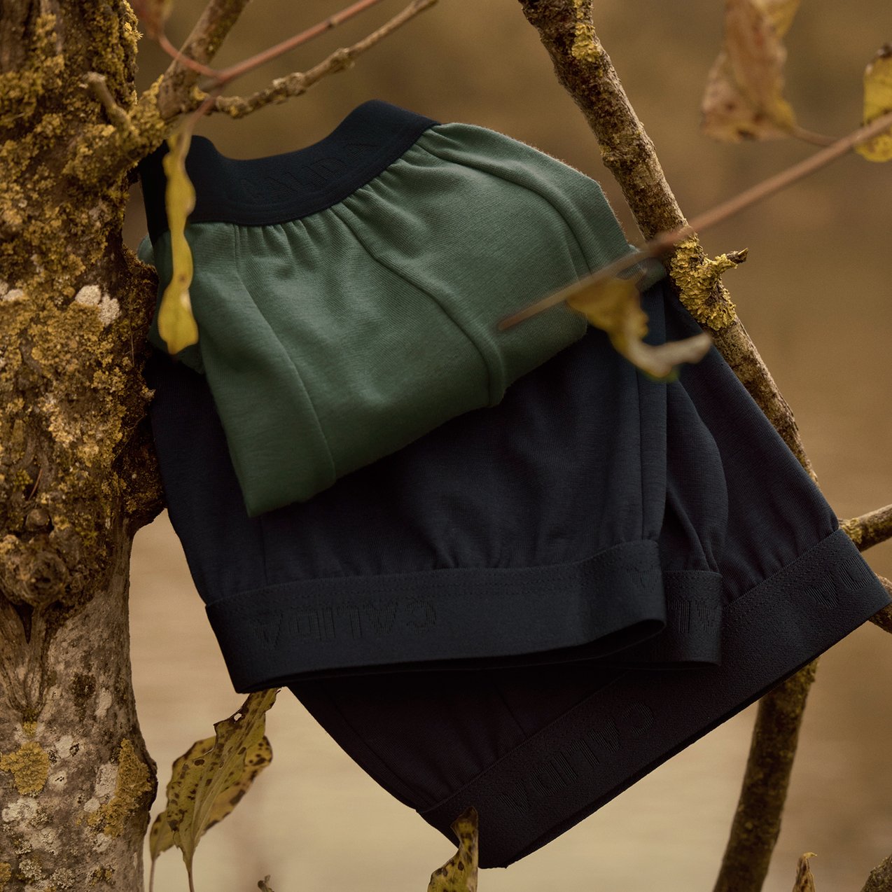 The picture shows a green and blue boxer set from the Natural Benefit range by CALIDA.