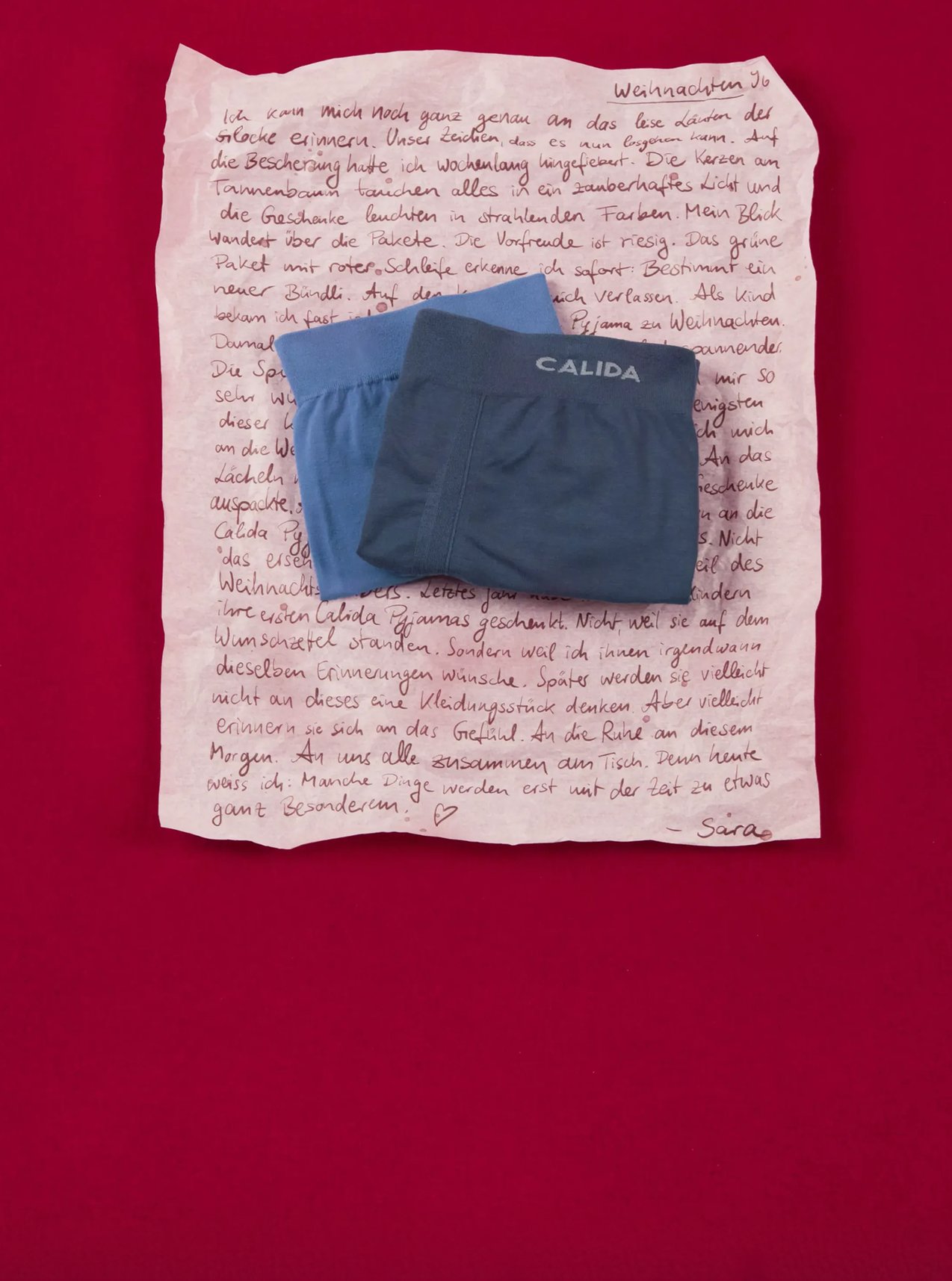 Sporty underwear in blue with an elastic comfort waistband, decorative against a festive background.