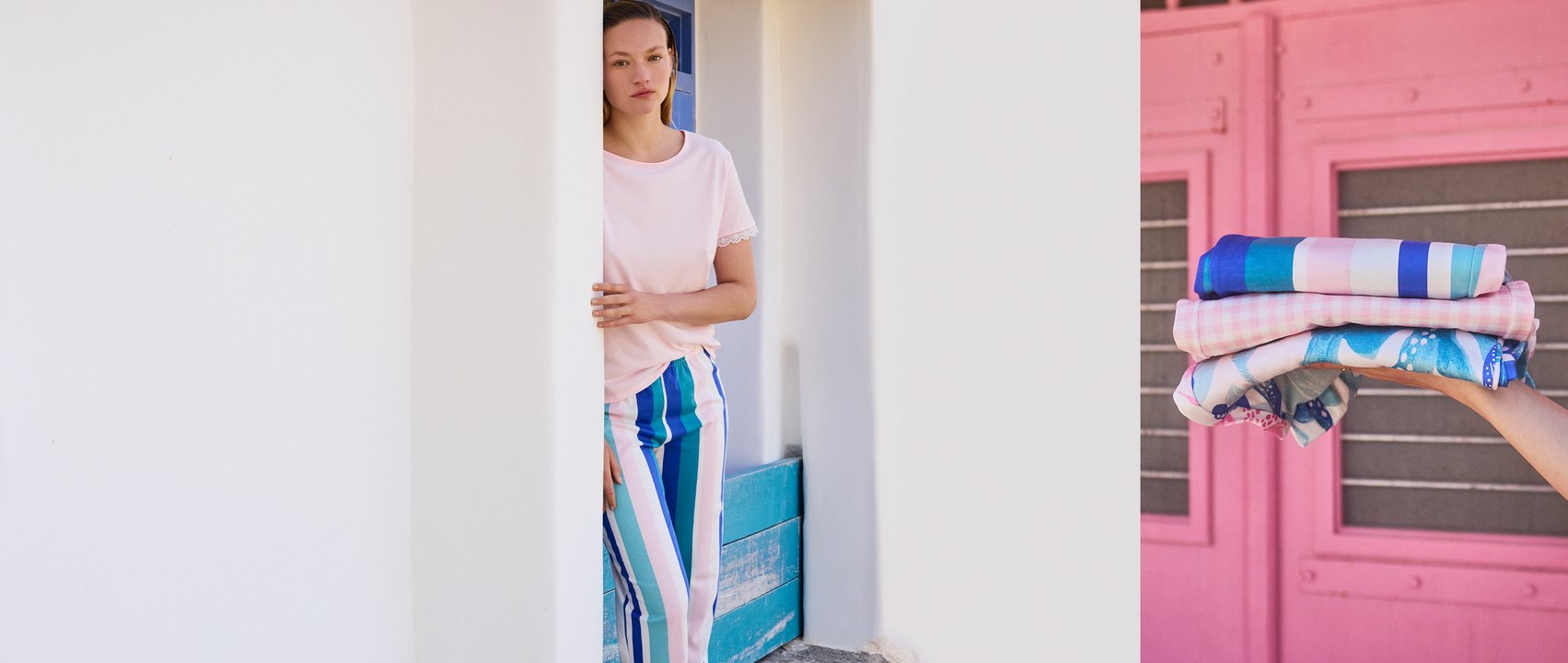 The woman is wearing pyjamas from the Favourites Coast blue range, very light and breathable.