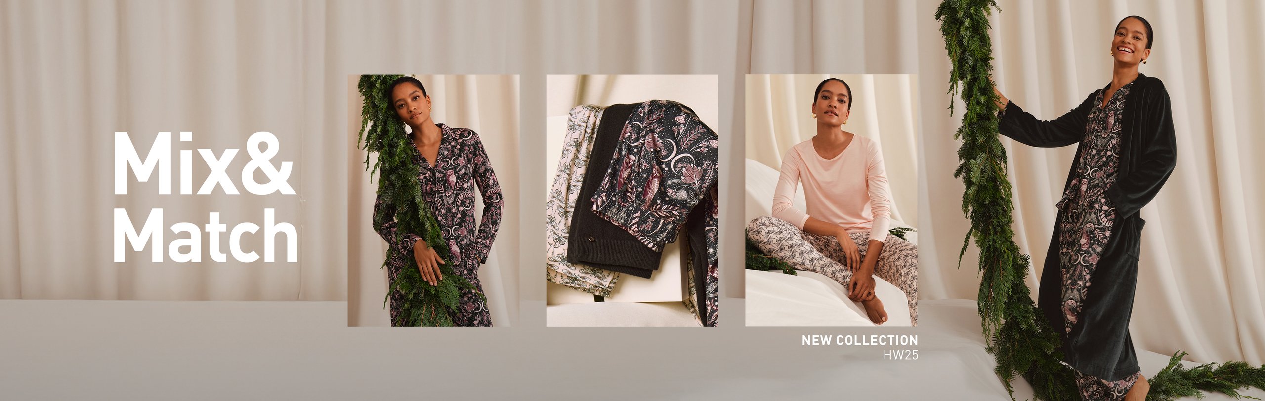 The model is wearing a pink T-shirt and floral print trousers from the Favorites Botanic range by CALIDA.