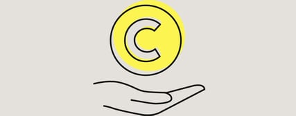 Un symbole jaune avec une pression de la main