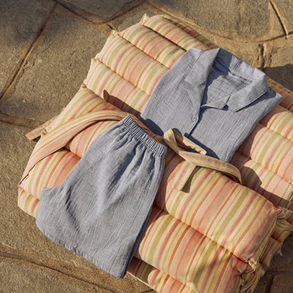 The image shows a blue and grey nightwear set from the Favourites Tiles range.