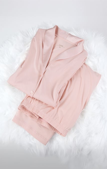 The image shows button-up pyjamas from the Night Lovers.