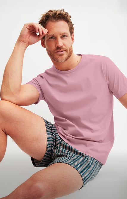 The man is wearing nightwear from DEEPSLEEPWEAR.