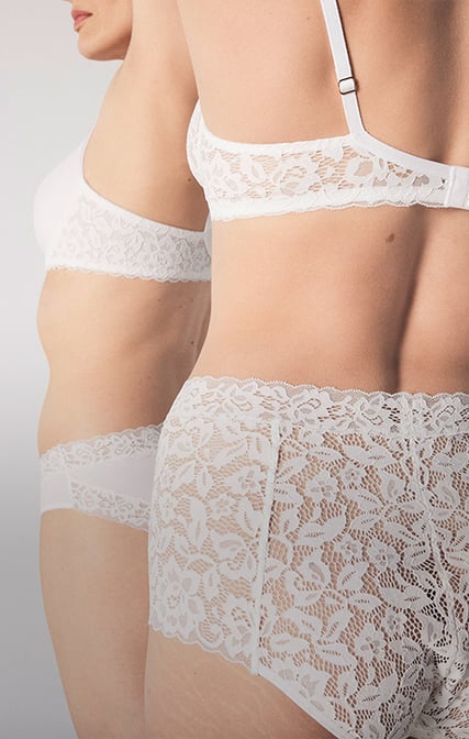 The ladies are wearing a set from the Natural Comfort Lace series in white.