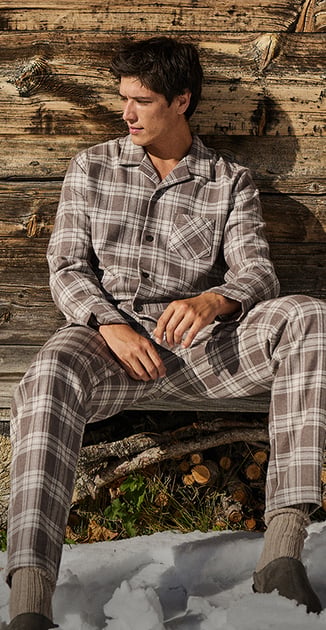 Image of striped pajama pants in dark elegant light.