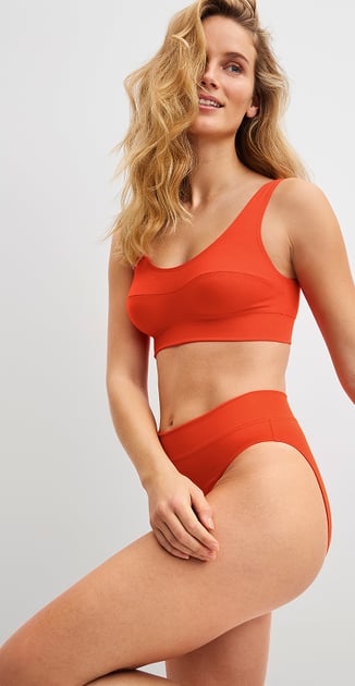 The model is wearing a bustier with matching briefs from our popular Elastic series.