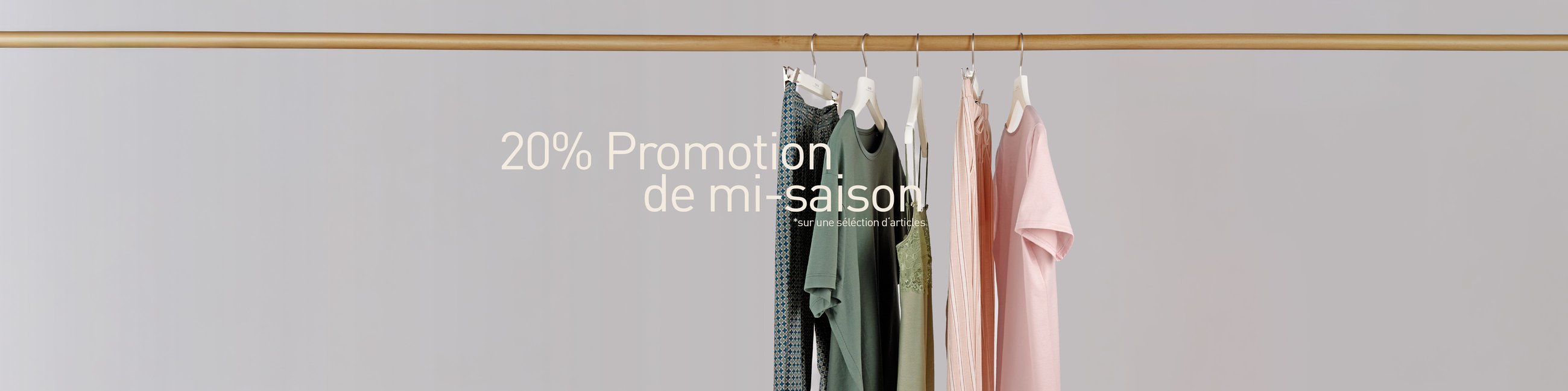 The image shows nightwear and underwear for men and women hanging on a clothes rail.