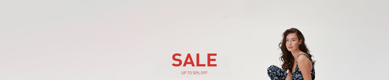 The lady is wearing a slip and a spaghetti-strap top from the Etude Toujours series.