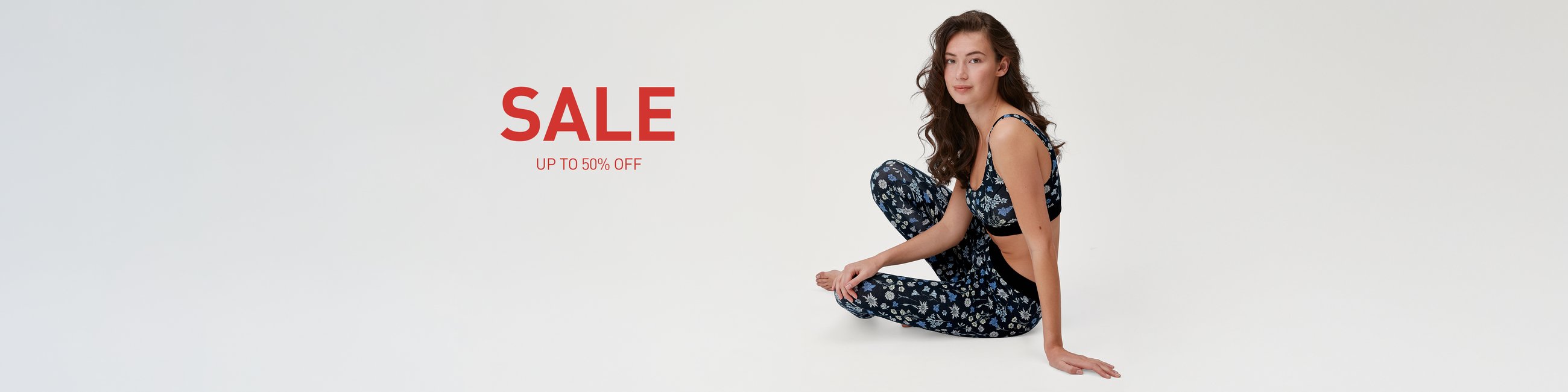 The lady is wearing a slip and a spaghetti-strap top from the Etude Toujours series.