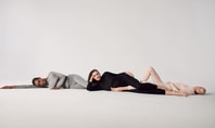 The picture shows three women lying relaxed in Calida clothing.