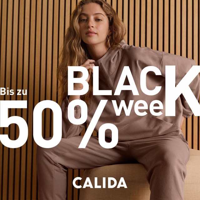 Person in taupe CALIDA loungewear in front of wooden slats – Black Week sale with up to 50% off