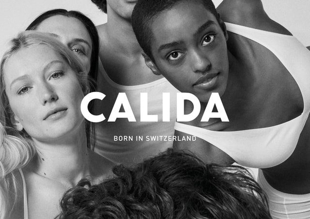4 people in a black and white picture. All are wearing CALIDA underwear. The CALIDA logo and the slogan ‘Born in Switzerland’ can be seen.